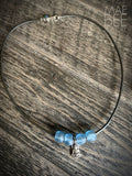 Sterling Silver Buddha Necklace: Recycled Blue Glass Beads, Leather Cord